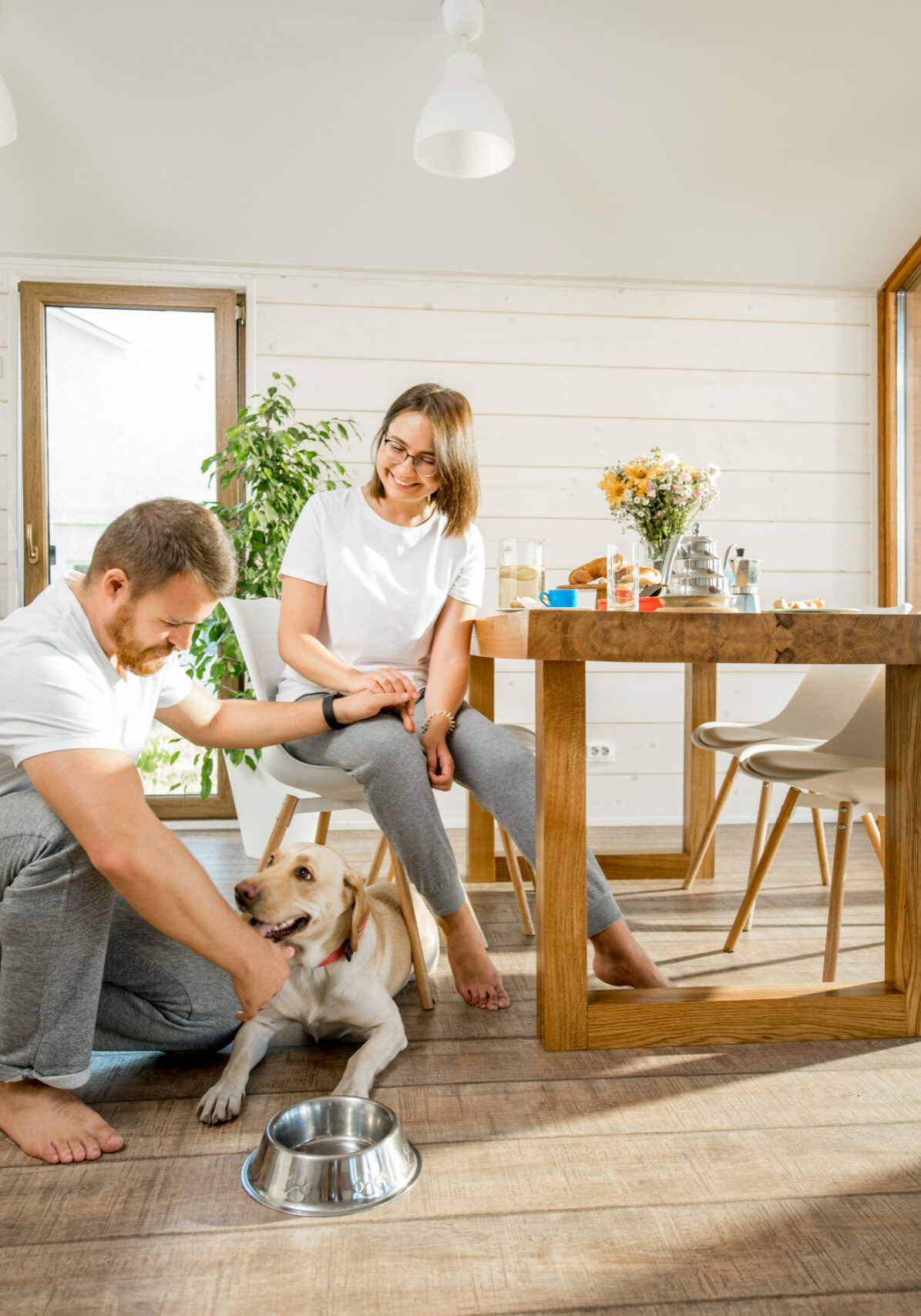 Young couple with dog at home | Floor to Ceiling St Joseph